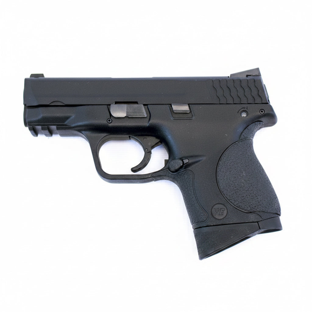 A black semi-automatic pistol, identified as a Sig Sauer P320, shown from a side profile against a plain white background.