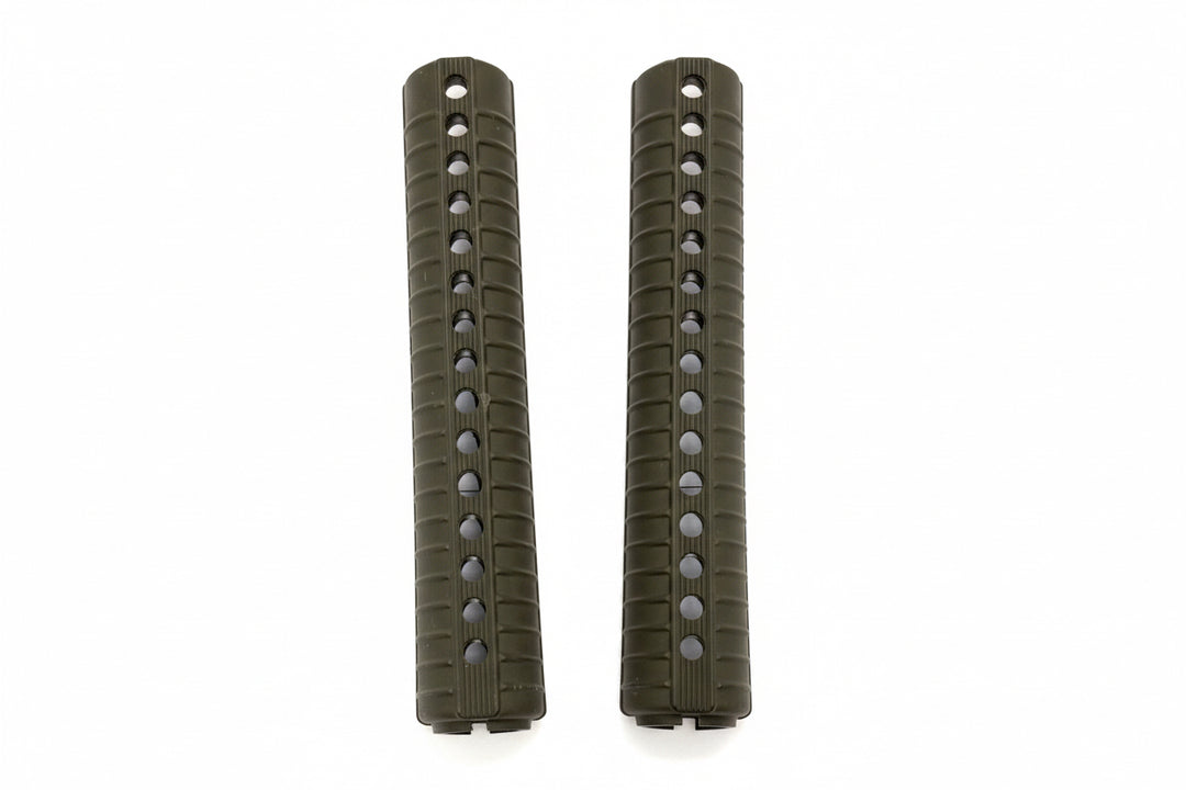 Two green tactical rifle grips on a white background