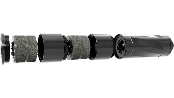 Black and gray cylindrical components on a white background